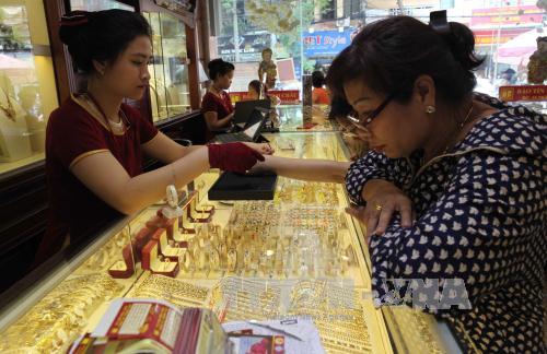 Giữa tuần giá vàng quay đầu giảm ảnh 1